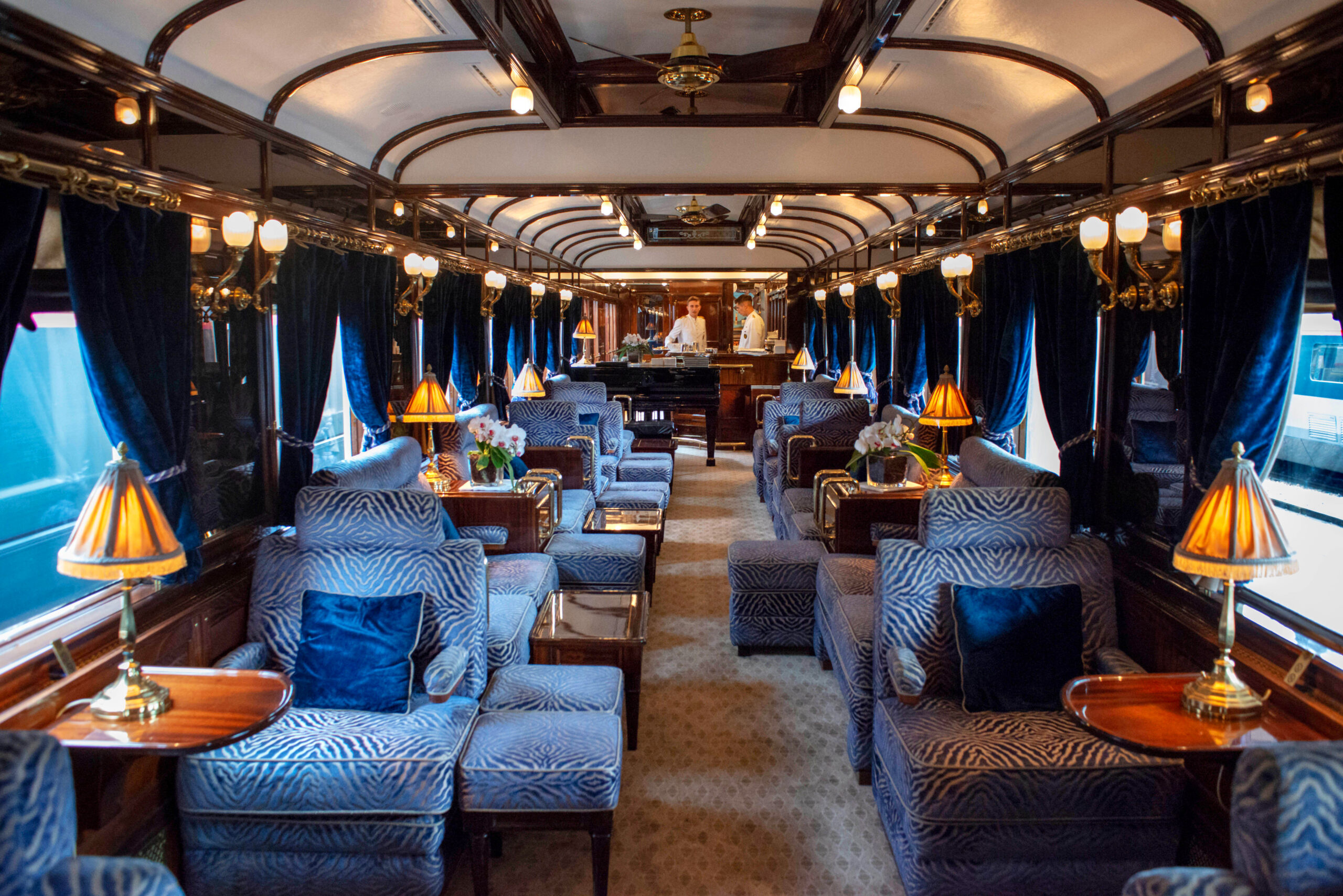 2C7DG8X The art deco bar lounge wagon of the train Belmond Venice Simplon Orient Express luxury train.  

An icon of art deco design. Rekindle the romance of